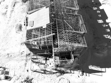 Aerial drone view of a multifamily apartment complex under construction. High quality photo