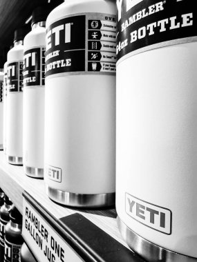 Omaha, Nebraska, USA - 7.6.2024: Selective focus on row of Yeti containers in an outlet store. High quality photo clipart