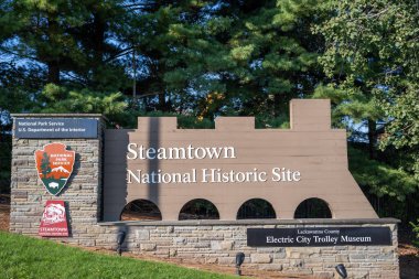 Scranton, Pennsylvania, USA - 9.22.2024: Entrance sign to Steamtown National Historic Site and Electric City Trolley Museum. High quality photo clipart