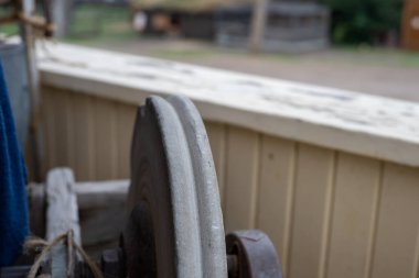 Vintage antique grinding wheel used to sharpen metal tools. High quality photo clipart