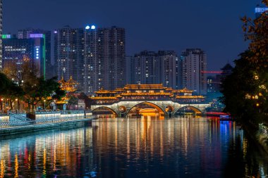 Chengdu Anshun bridge and Jinjiang river at night, Sichuan province, China clipart