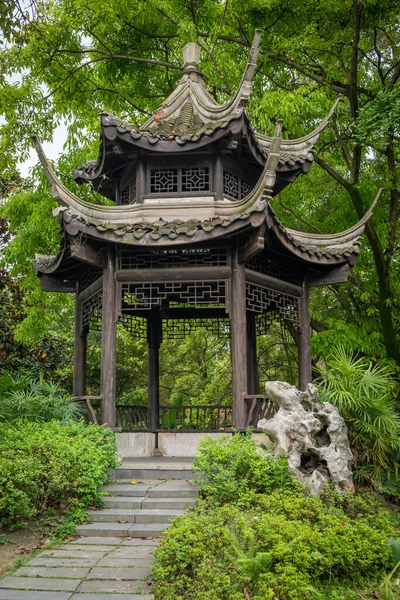 stock image Chinese traditional pavilion on a hill in Yi Yuan Yuan Lin Bo Wu Guan Park, Chengdu, Sichuan province, China