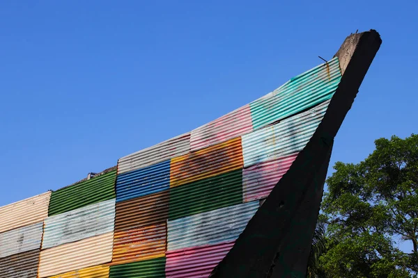 Colorful asbestos building with clear blue sky in the morning