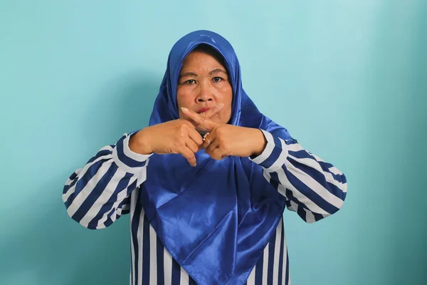 Serious Middle Aged Asian Woman Blue Hijab Striped Shirt Makes — Stock Photo, Image