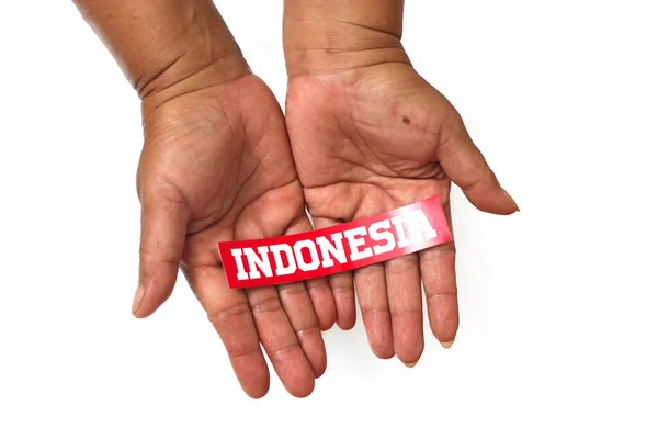 Tangan Memegang Kertas Teks Indonesia Dengan Ruang Salinan Kosong Terisolasi — Stok Foto