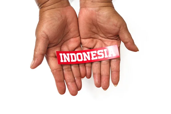 Χειρός Κρατώντας Indonesia Κείμενο Χαρτί Κενό Χώρο Αντίγραφο Απομονώνονται Λευκό — Φωτογραφία Αρχείου