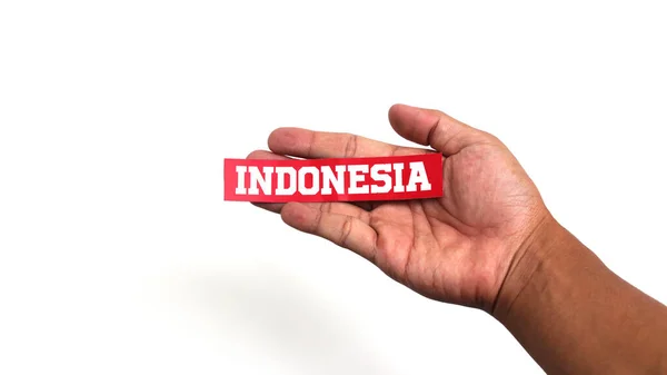 Hand Holding Indonesia Text Paper Empty Copy Space Isolated White — Stock Photo, Image