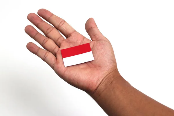 Mão Segurando Bandeira Indonésia Com Espaço Cópia Vazio Isolado Fundo — Fotografia de Stock