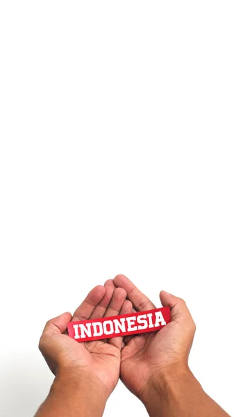Hand Holding Indonesia Tekstpapier Met Lege Kopieerruimte Geïsoleerd Witte Achtergrond — Stockfoto