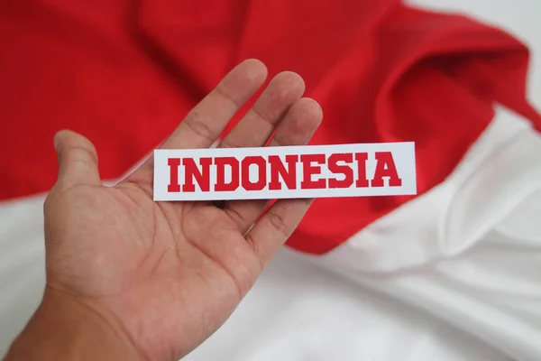 Hand Holding Indonesia Text Paper Empty Copy Space Isolated White — Stock Photo, Image