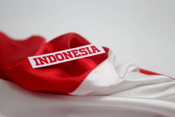 Κείμενο Indonesia Στο Φόντο Της Κόκκινης Και Λευκής Σημαίας Κενό — Φωτογραφία Αρχείου