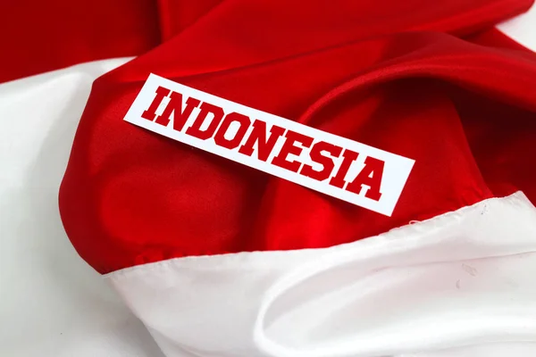Teks Indonesia Pada Latar Belakang Bendera Merah Dan Putih Dengan — Stok Foto