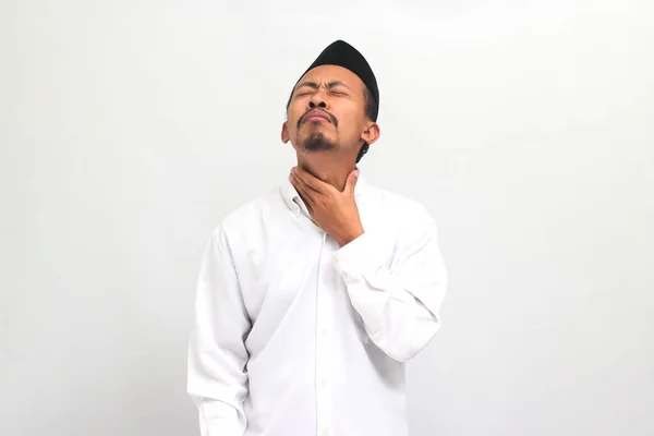 Joven Indonesio Triste Usando Una Canción Peci Kopiah Sosteniendo Cuello —  Fotos de Stock