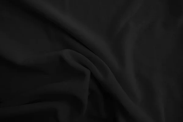 要旨黒い波状の布 ダークファブリックの背景 — ストック写真