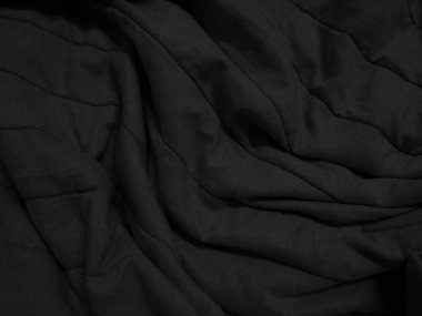 Siyah dalgalı kumaş. Kumaş arkaplanı
