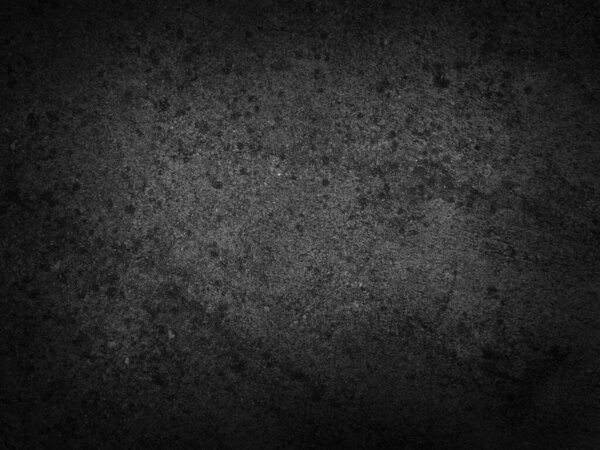 Текстура поверхности цемента в черном цвете. Темно-бетонный фон