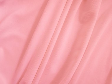 Pembe buruşuk kumaş arka plan. Dalgalı kumaş dokusu