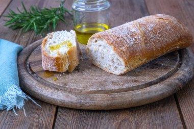 Italian ciabatta bread with olive oil, selective focus. High quality photo