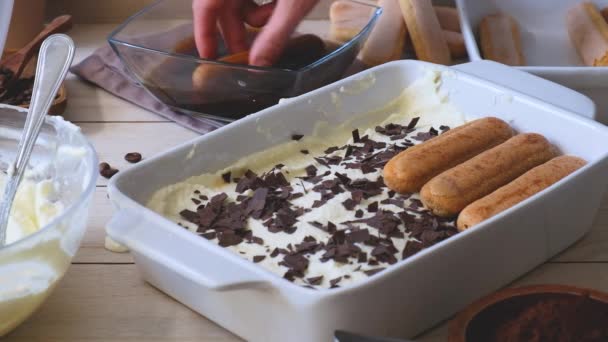Womans Hand Soaks Cookie Coffee Puts Tray Make Tiramisu Cake — Stock Video