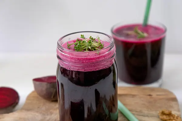 Beetroot smoothie in a jar. Beetroot and microgreens smoothie. High quality photo