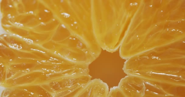 旋转的橙片 在电影摄像机上拍的4K — 图库视频影像