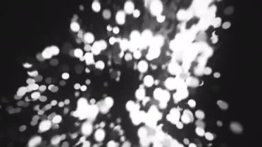 Çerçevesinde anamorfik bokeh kıvrımlı 4K organik parçacıklar.