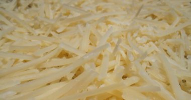 Taze rendelenmiş parmesan Macro sondası. 4K 'da bir sinema kamerasında çekildi..
