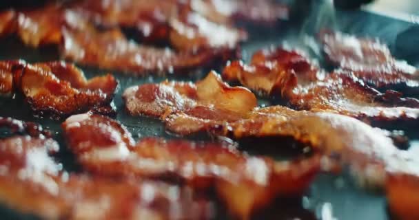 Closeup Slider Shot Fresh Bacon Being Flipped Griddle Cinematic Footage — Stock Video