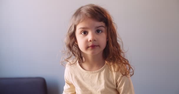 Cute Pensive Toddler Girl Staring Camera Footage — Stock Video