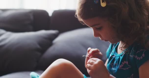 Cute Toddler Girl Playing Stickers Shot Cinema Camera — Stock Video