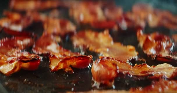 Closeup Shot Fresh Bacon Sizzling Griddle Cinematic Footage — Stock Video