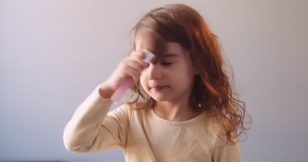 Cute Toddler Girl Applying Makeup Herself Shot Cinema Camera — Stock Video