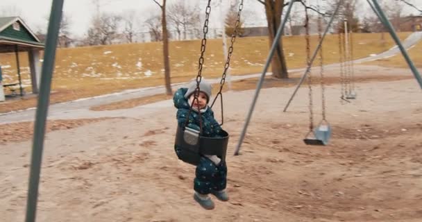 Toddler Girl Playing Toronto Park Late Winter Cinematic Footage — Stock Video