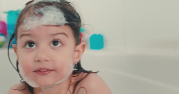 Cute Toddler Girl Having Bubble Bath Cinematic Footage — Stock Video