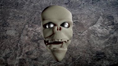 Digital sculpture of an elongated antediluvian Nephilim skull with metallic spheres for eye holes..