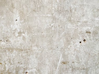 Weathered white cement wall background and texture for modern or retro and vintage interior design