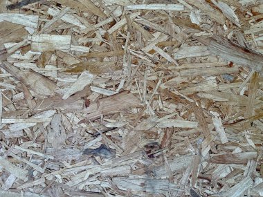 Strand tahtası arka planı ve dokusu. Yönlendirilmiş Strand tahtası (OSB)