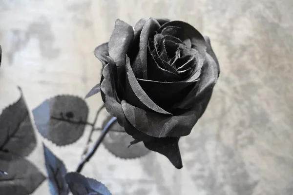 Black rose. Black srtificial rose flower, selective focus