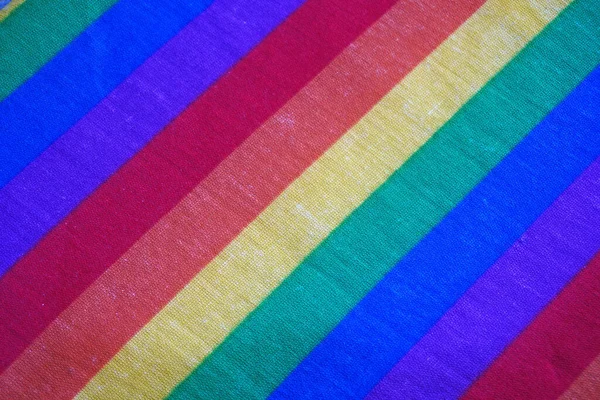 Rainbow color background and texture for Pride month. Rainbow fabric texture background for LGBTQ+