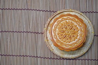 Moon cakes for mid autumn festival (Moon festival) Traditional Chinese mooncake for Zhong Qiu festival. Top view with copy space clipart