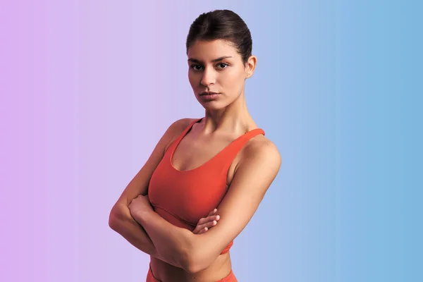 Young Self Assured Ethnic Female Red Sports Top Standing Crossed — Stock Photo, Image
