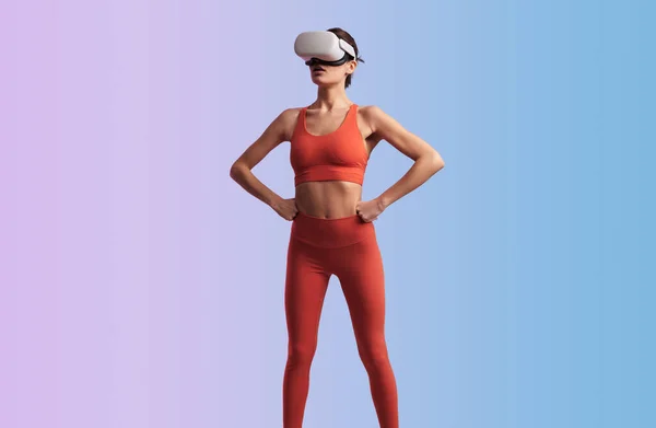 Sporty Woman Headset Activewear Standing Hands Waist Gradient Background Studio — Stock Photo, Image