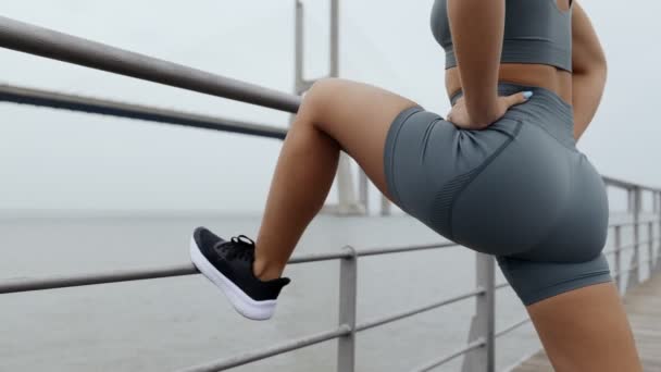 Crop Shot Woman Runner Skintight Sportswear Stretching Legs Muscles Warming — Stock Video