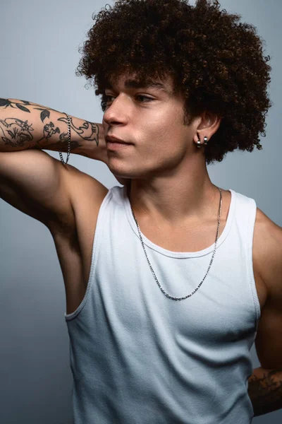 Pensive Muscular Brazilian Male Outlaw Gang Curly Hair Tattoos Necklace — Stockfoto