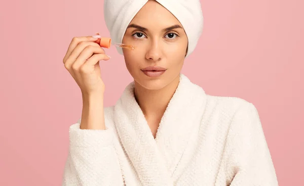 Young Attractive Female Model White Bathrobe Towel Head Applying Liquid — Stock Photo, Image