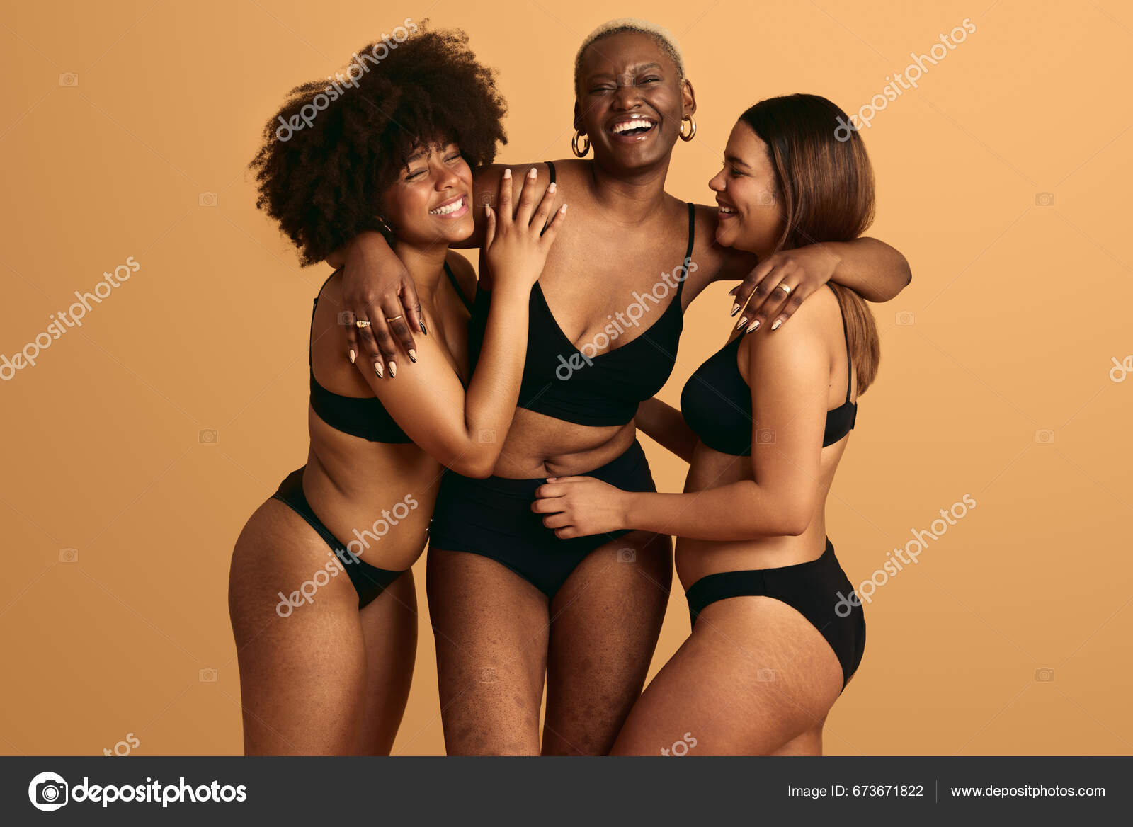 Cheerful Diverse Girlfriends Black Underwear Hugging Each Other Orange  Background Stock Photo by ©kegfire 673671822