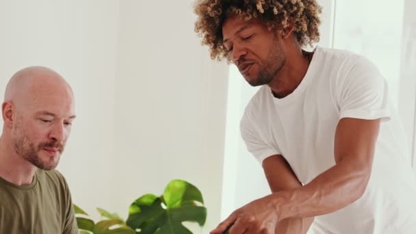 Black African Man Curly Hair Lovingly Serves Breakfast His Caucasian — Stock Video