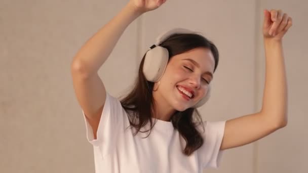 Closeup Carefree Teenager Wearing Noise Canceling Headphones Dancing Energetically Loud — Stock Video