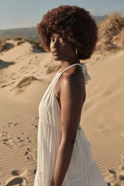 Portrait African Female Afro Hair Wearing White Dress Standing Sand — Stok Foto