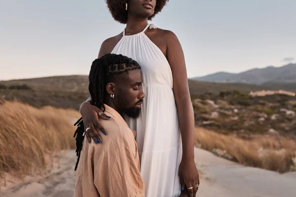 Crop African Woman Afro Hair White Dress Embracing Loving Boyfriend — Stok Foto